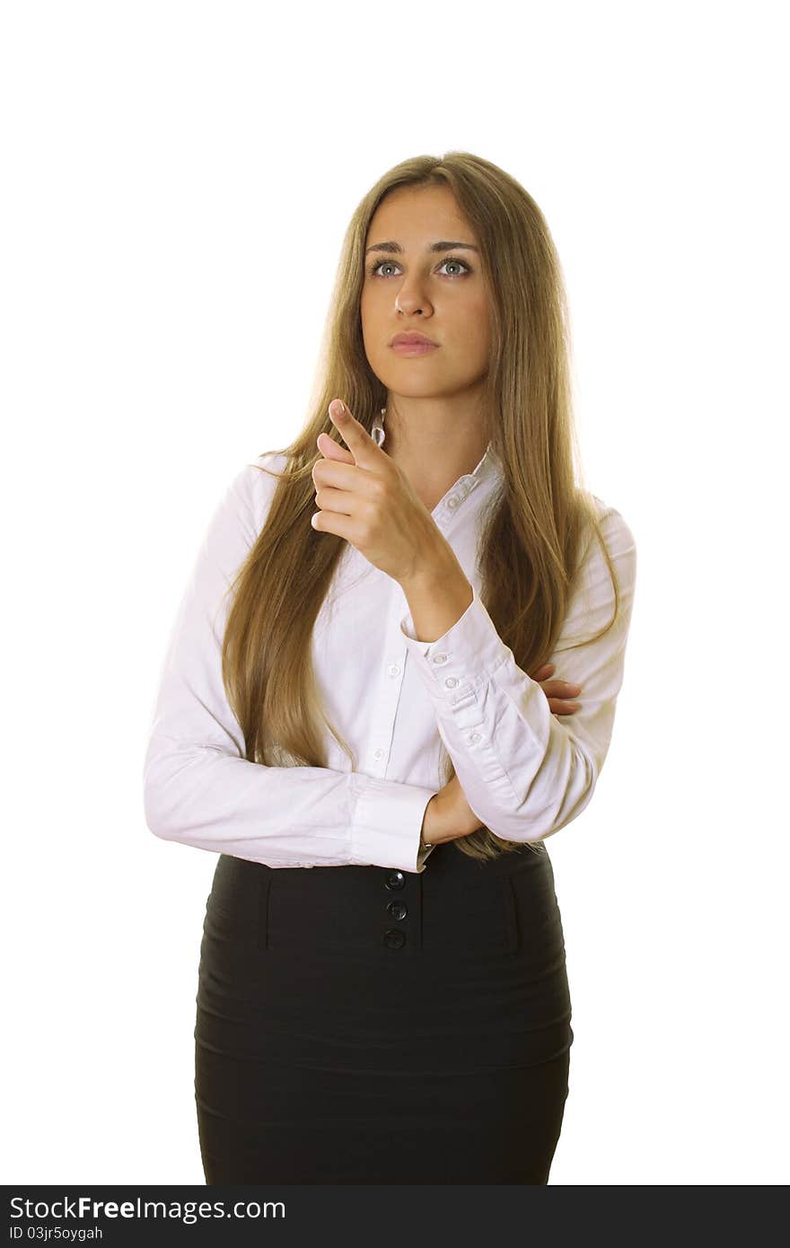 Young beautiful female business executive pointing at copyspace. Isolated on a white background. Young beautiful female business executive pointing at copyspace. Isolated on a white background