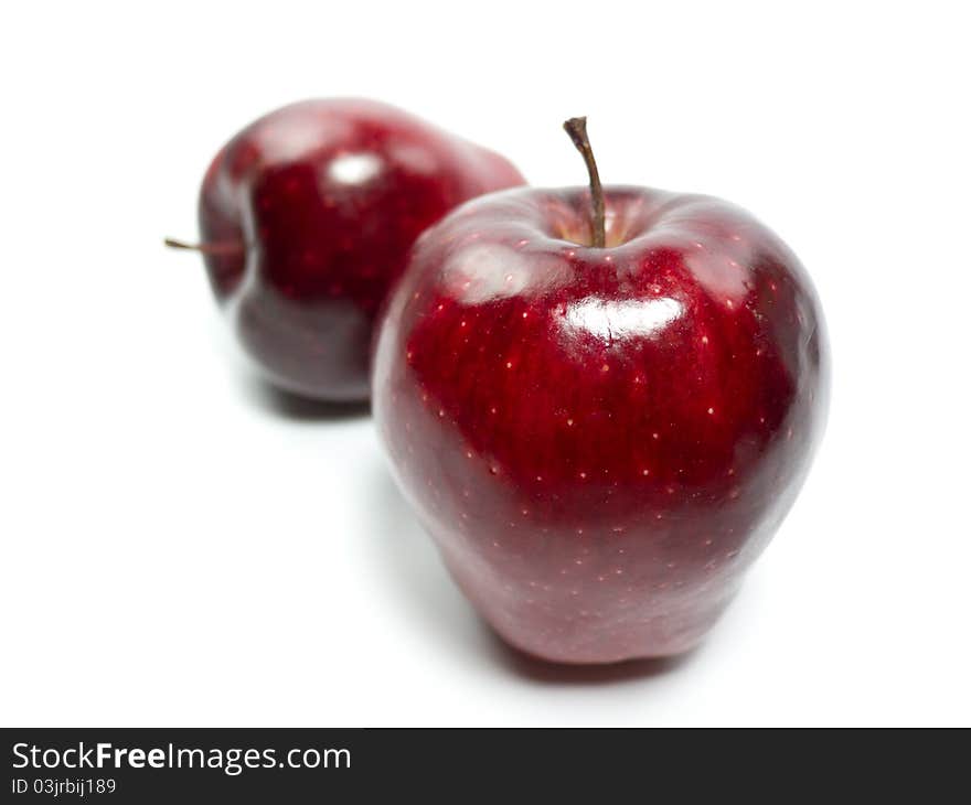 Red apples isolated on white background with shadow.