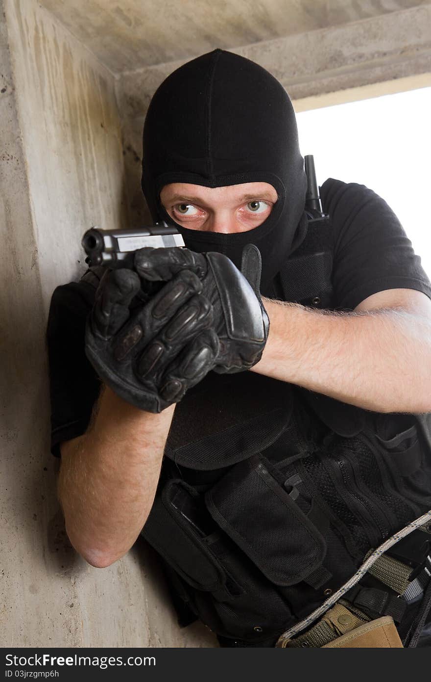 Soldier In Black Mask With 9mm Pistol