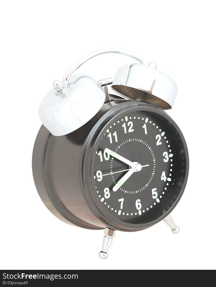 Black alarm clock isolated on white