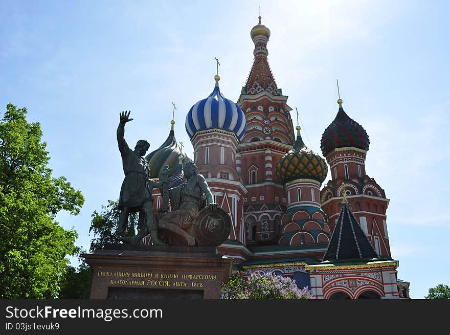 view of the temple of Basil blessed on red square and the monument to Minin and Pozharsky. view of the temple of Basil blessed on red square and the monument to Minin and Pozharsky