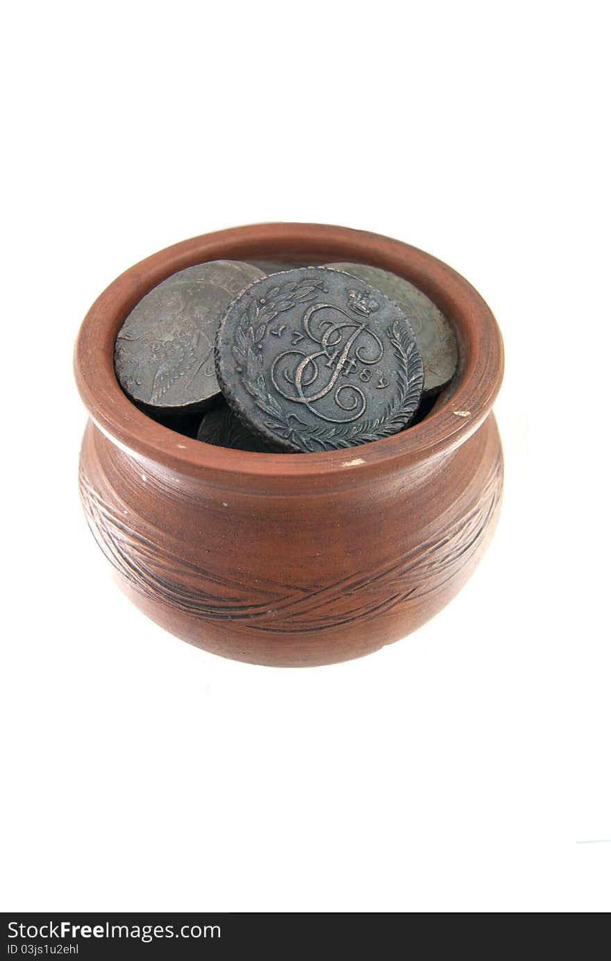 Old traditional clay mug with ancient Russian coins on white background. Old traditional clay mug with ancient Russian coins on white background