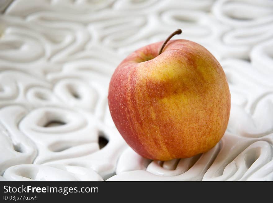 Apple on white bowl