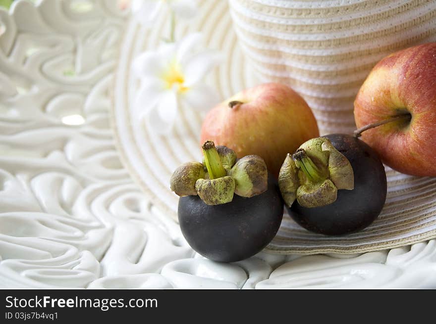 Fruits and summer hat