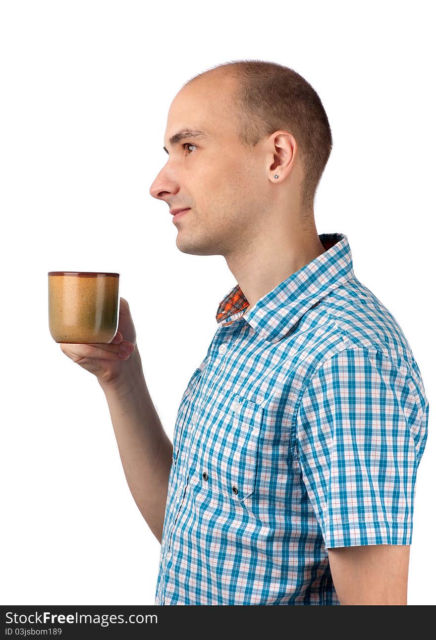 Young happy smiling man drinking coffee. Young happy smiling man drinking coffee