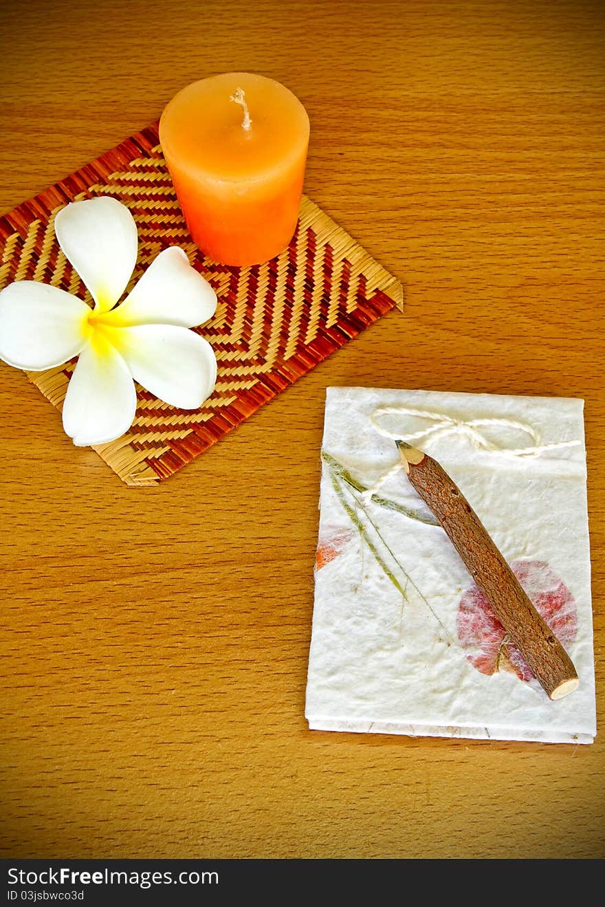 Wood pencil with natural notebook on table