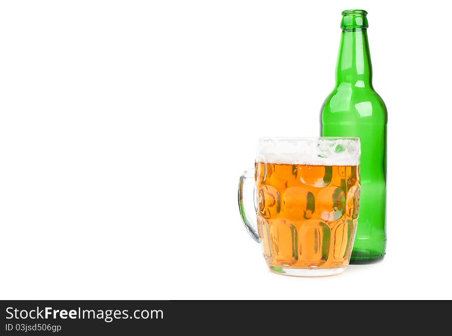 Green bottle and beer isolated on a white background