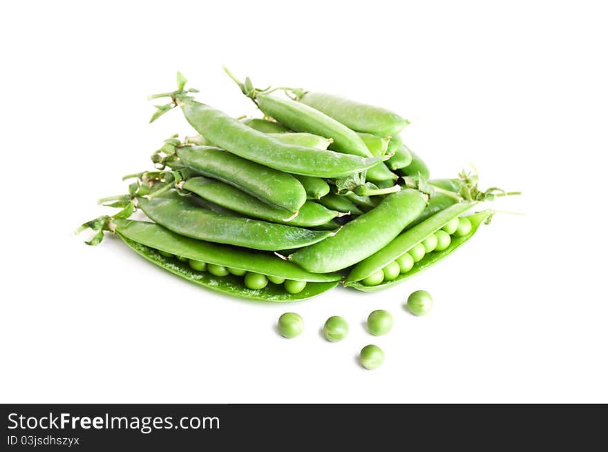 Fresh green peas isolated on a white background