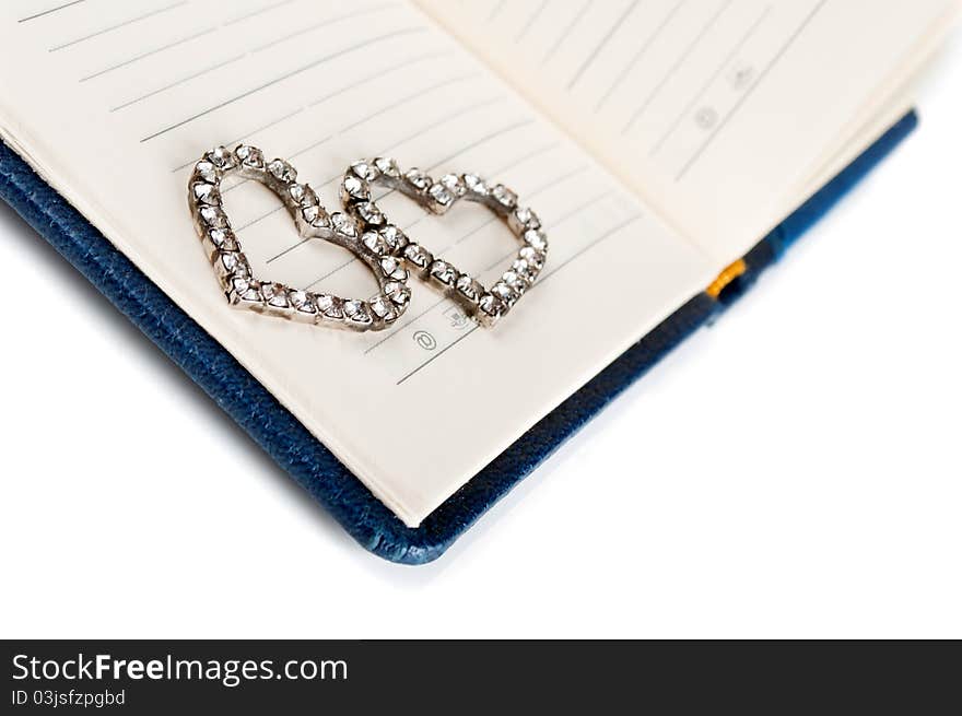 Heart on a notebook page isolated on a white background