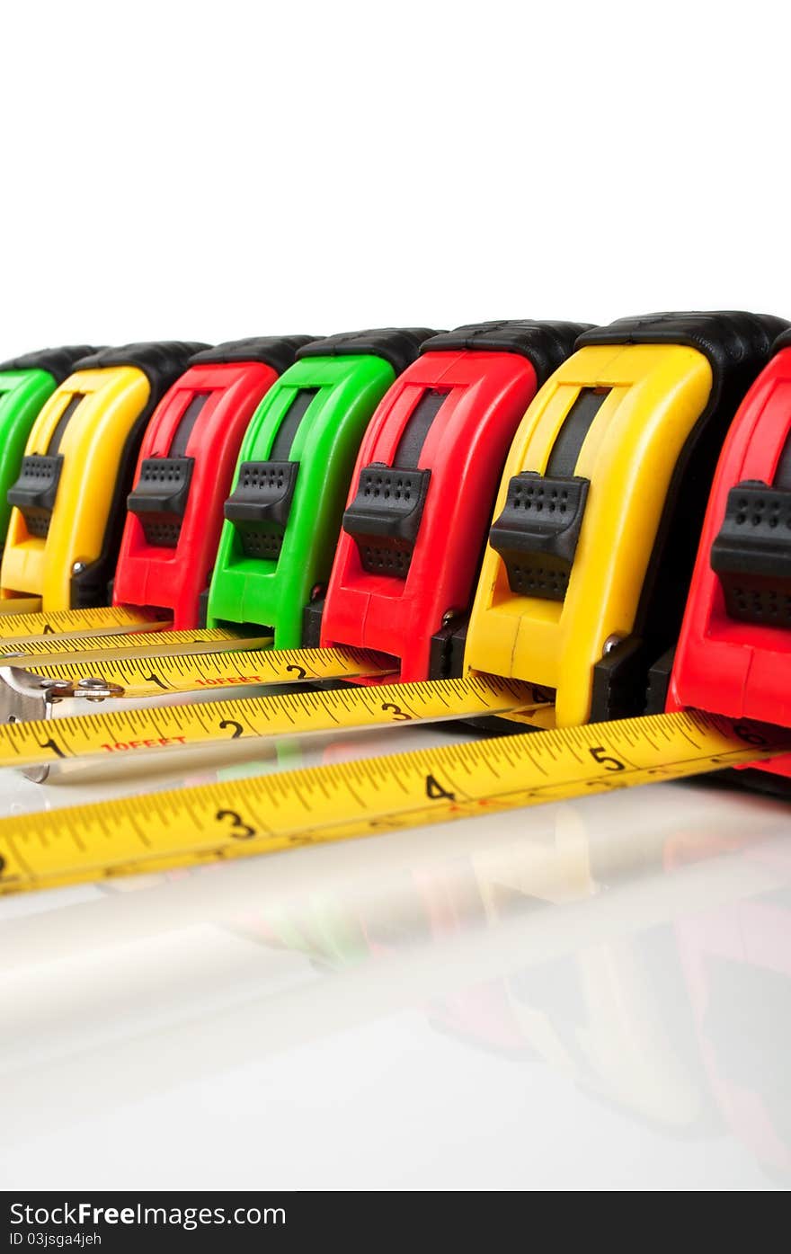 Many tape measure isolated on a white background