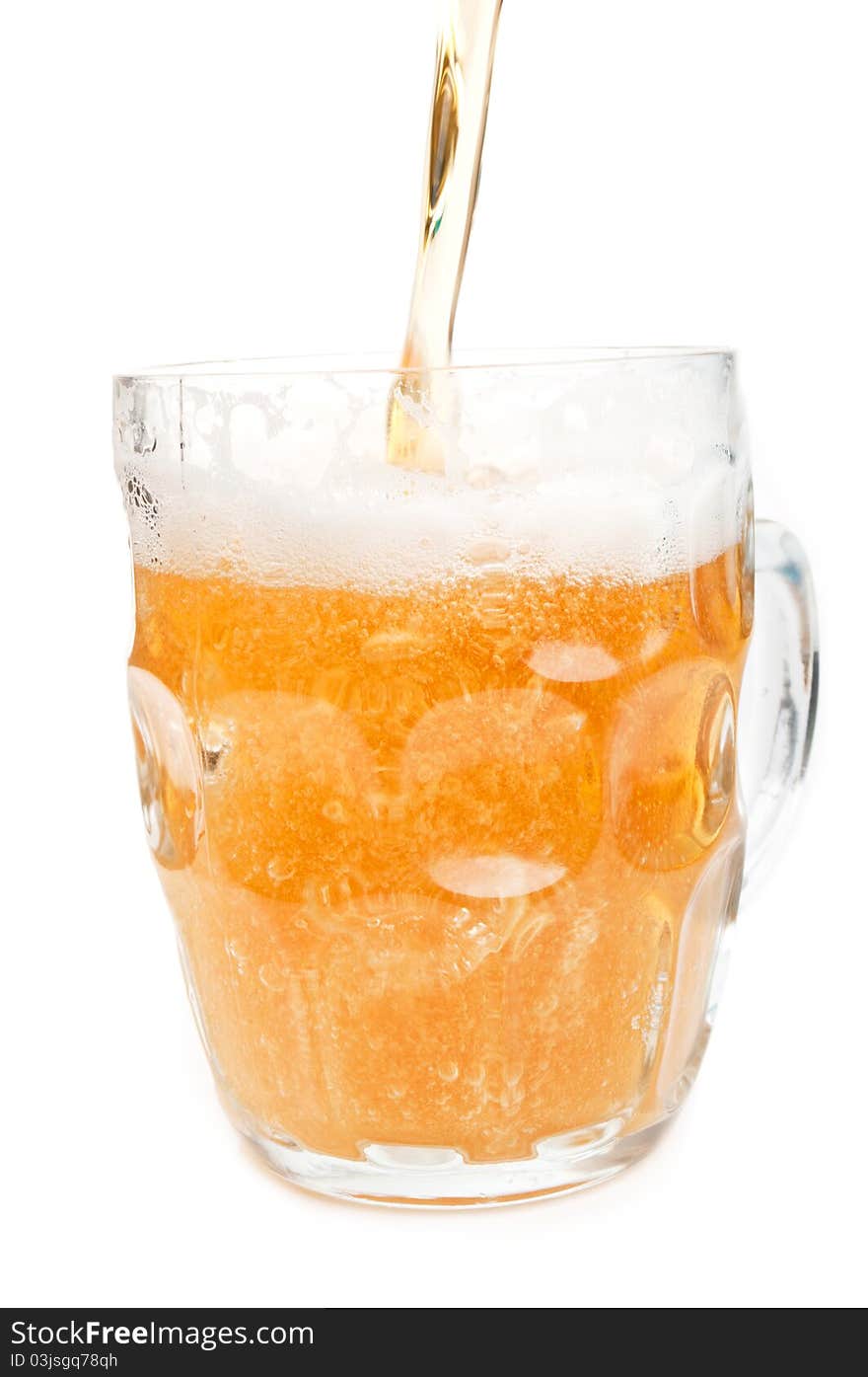 Glass of beer isolated on a white background