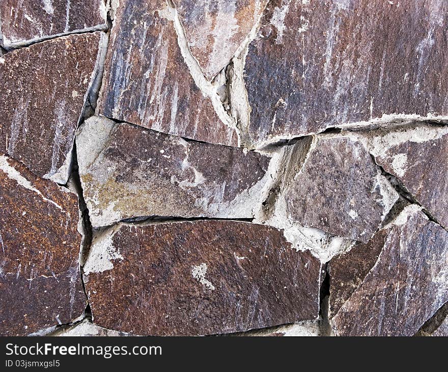 Stone tiles on wall; abstract pattern. Stone tiles on wall; abstract pattern