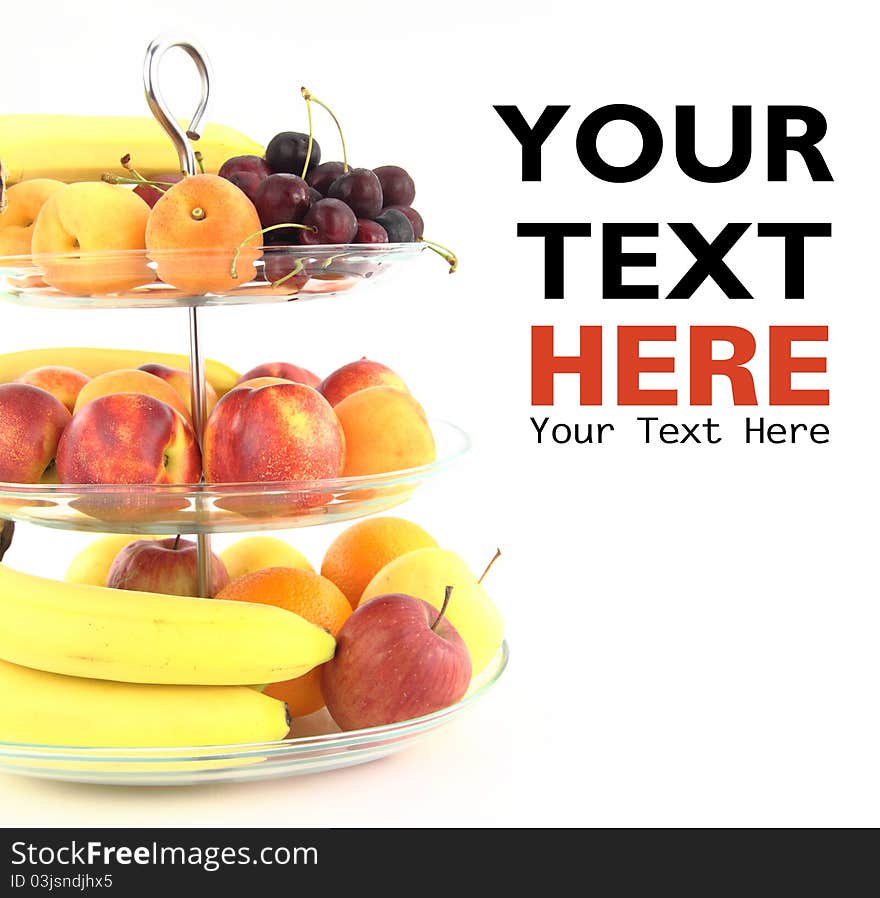 Fresh fruits in a glass fruit bowl