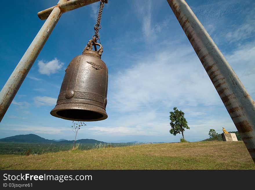 Bell on mountain and blue sky