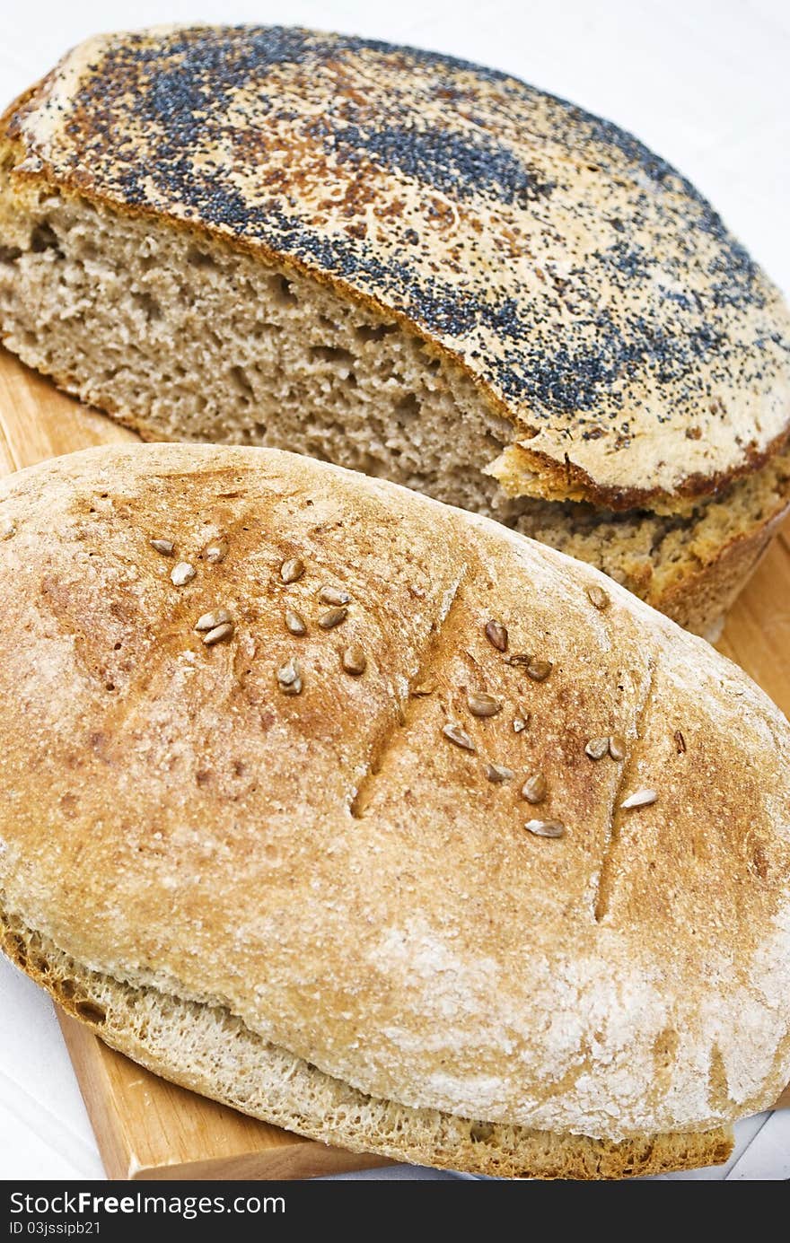 Two loafs of dark wholemeal homemade bread. Two loafs of dark wholemeal homemade bread