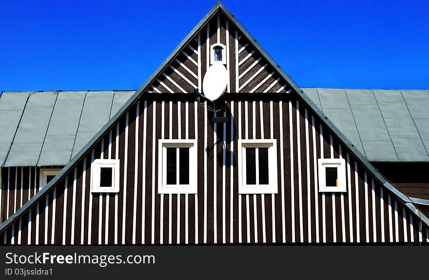 Old wooden house with satellite dish. Old wooden house with satellite dish