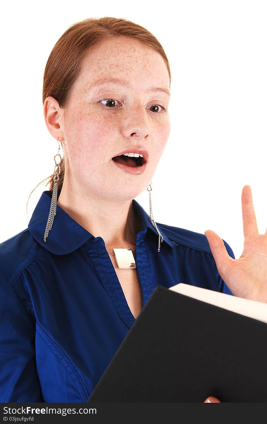 A young woman reading a book and is shocked what she seen. A young woman reading a book and is shocked what she seen.