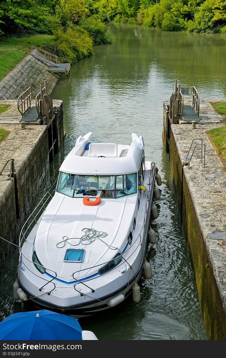 Passage of a boat at a lock. Passage of a boat at a lock