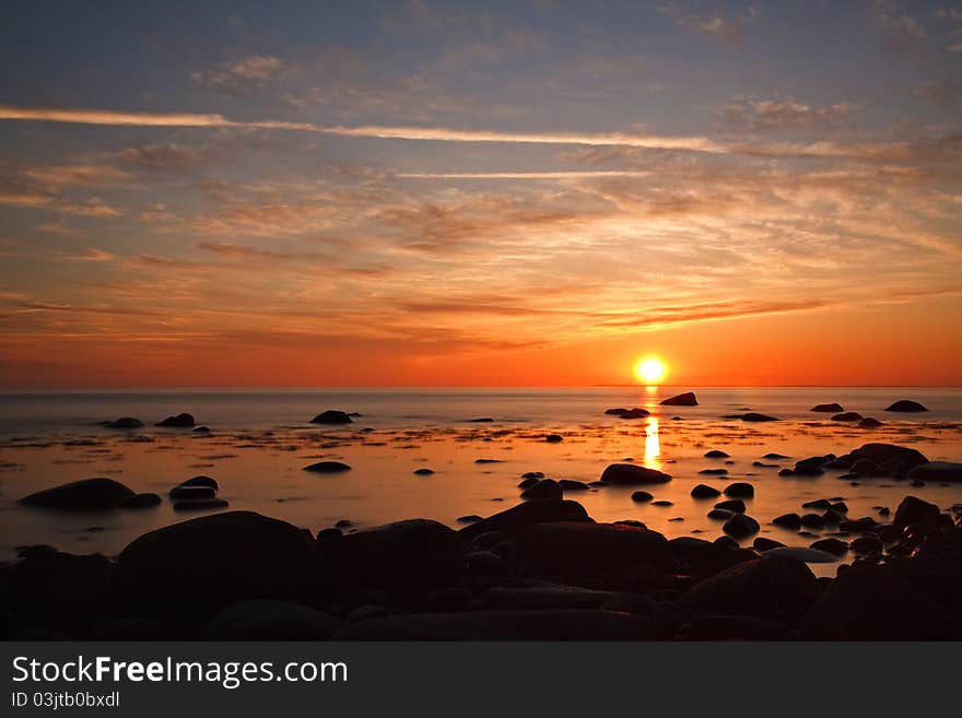 Sunset on the Baltic Sea coast in Lohme (Germany)