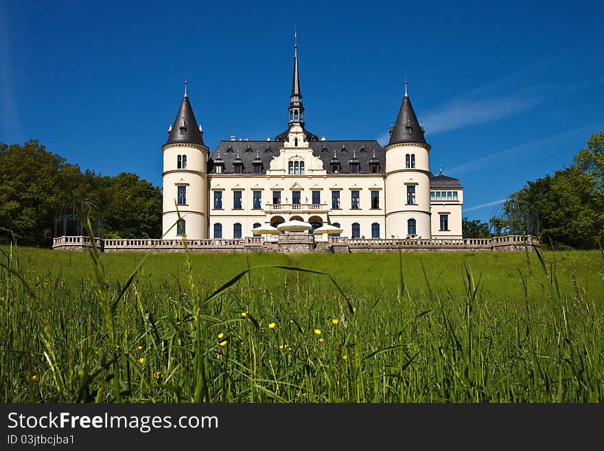 Castle with meadow in Ralswiek (Germany).