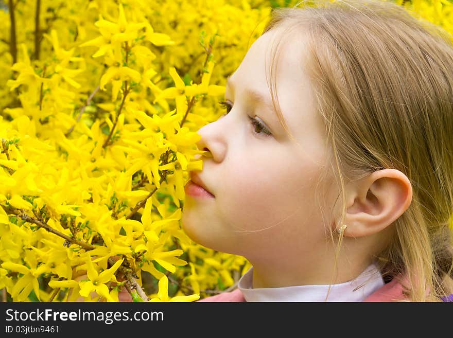 Beautiful girl with yellow flowers