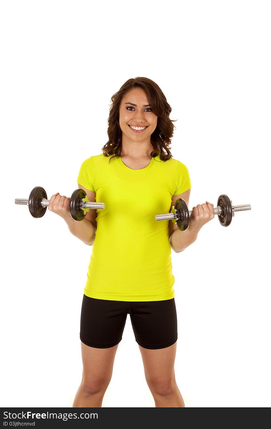 A woman getting fit lifting weights. A woman getting fit lifting weights.