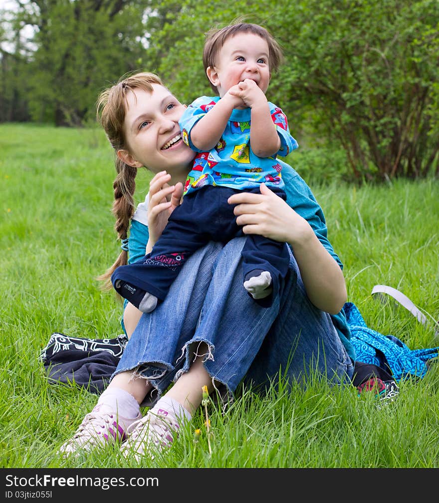 Young mother with son outdoor