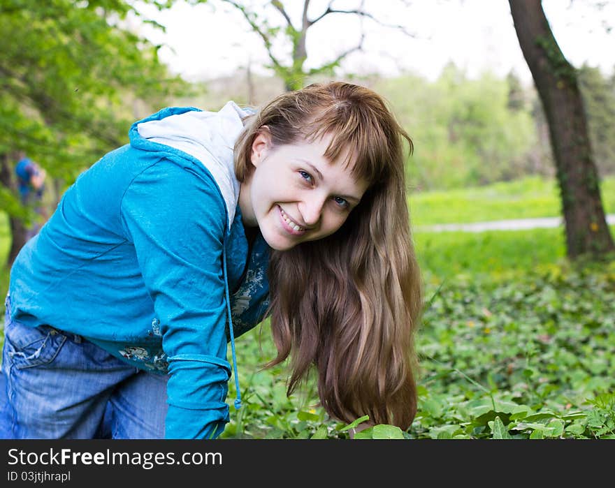 Single beautiful woman relaxing at the park. Single beautiful woman relaxing at the park