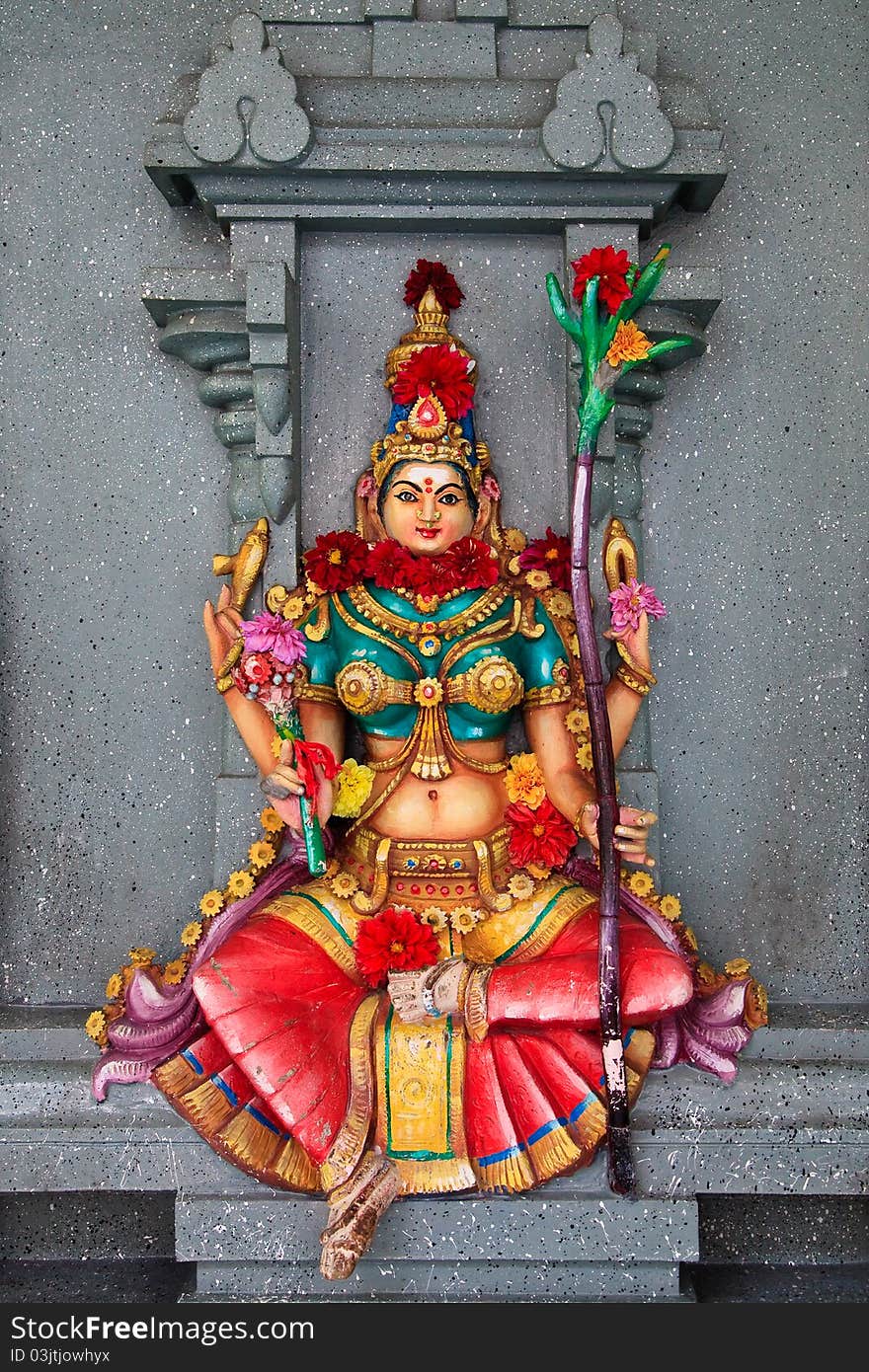 Woman sculpture in a hindu temple in Malaysia