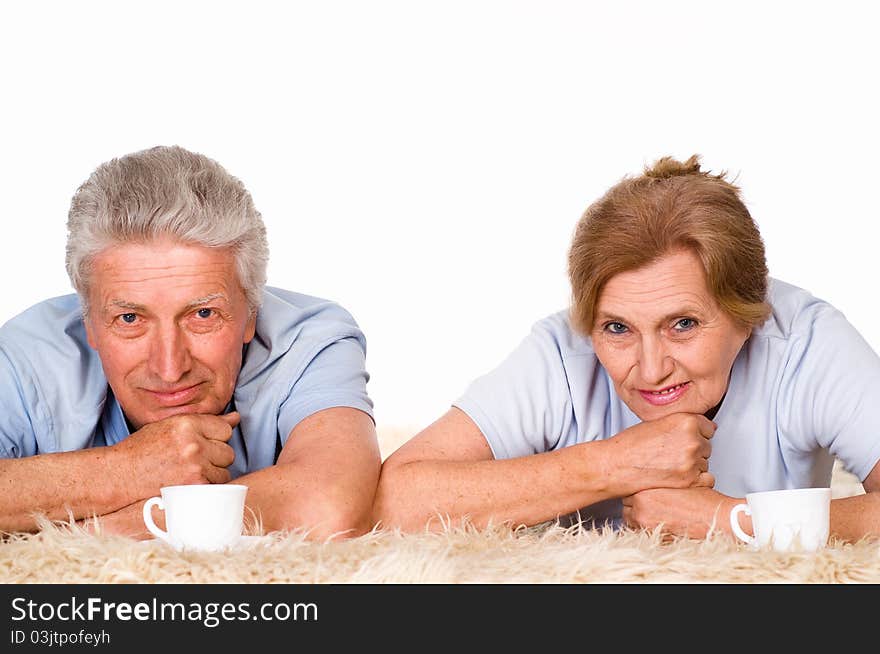 Happy elderly couple on a white background. Happy elderly couple on a white background