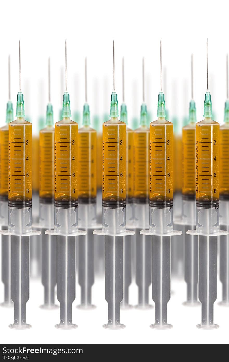 Many syringe with liquid, isolated on white