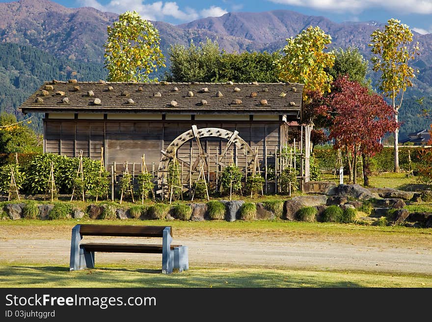 View on the water mill in the park, Toyama prefecture, Japan