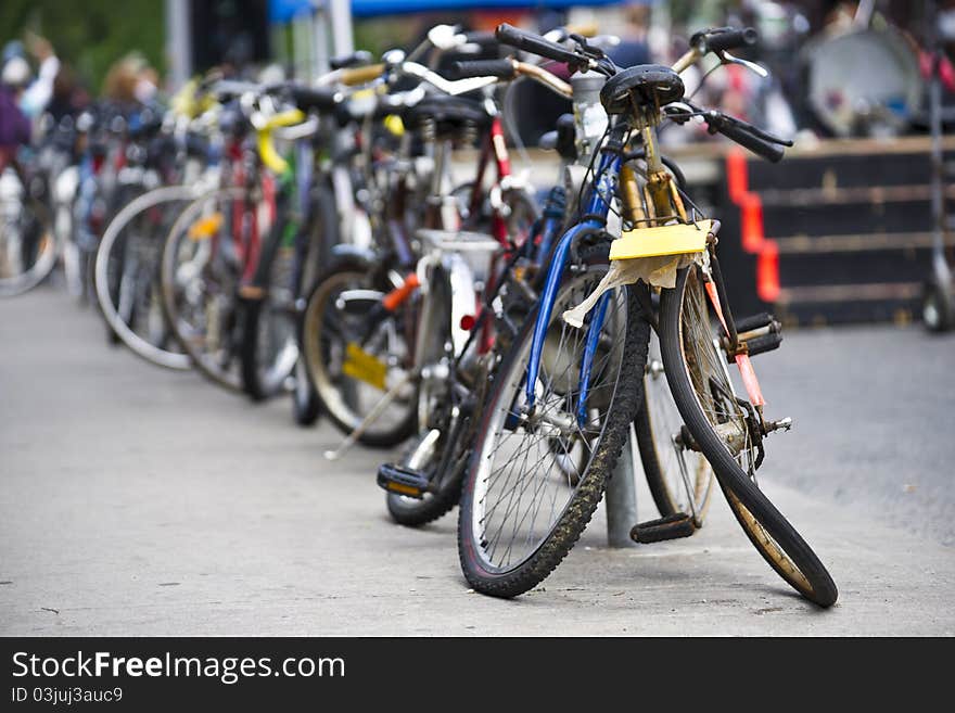 Broken Bicycle with other bicycles in the background. Broken Bicycle with other bicycles in the background