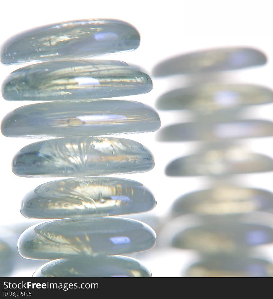 Stones and water on white background. Stones and water on white background