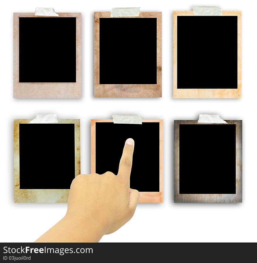 Human hand point at old vintage photo frame