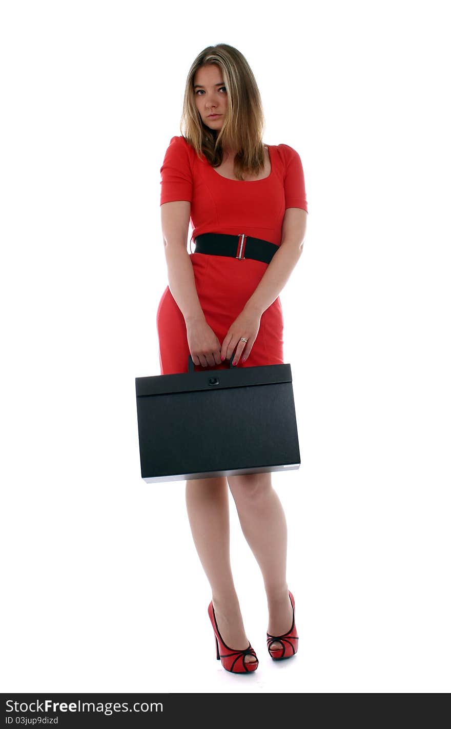 Stylish business woman in red holding holding briefcase. Stylish business woman in red holding holding briefcase