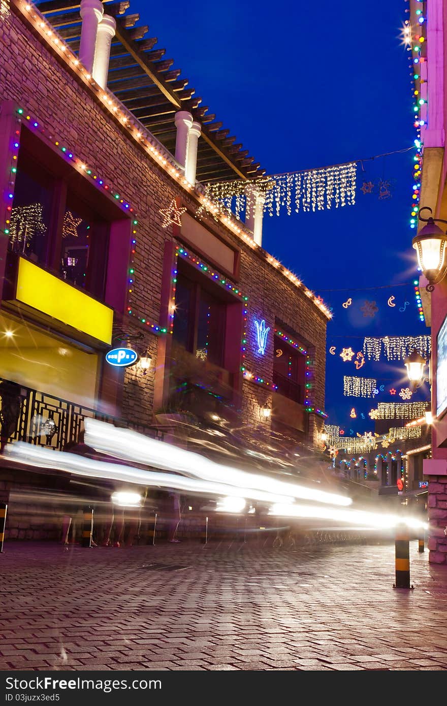 Bar Street at night with car blur, Beijing, China