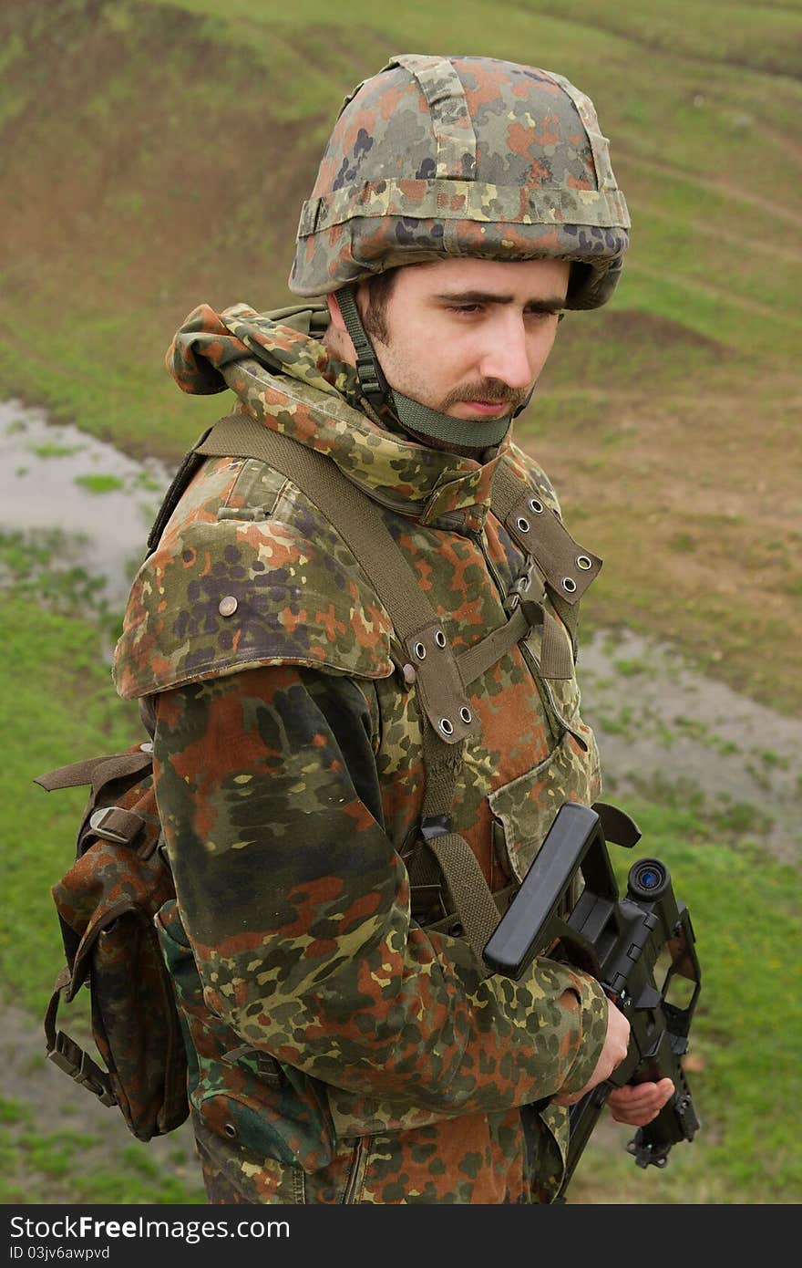 Portrait of soldier with a rifle