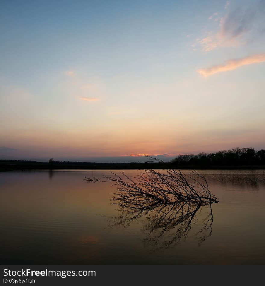 Tranquil Scene Of Sunset At The Lake