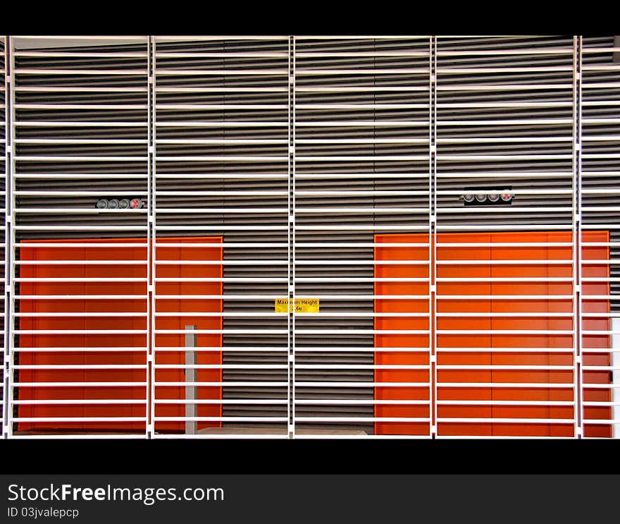 Lines, orange storage doors, security and colour. Lines, orange storage doors, security and colour