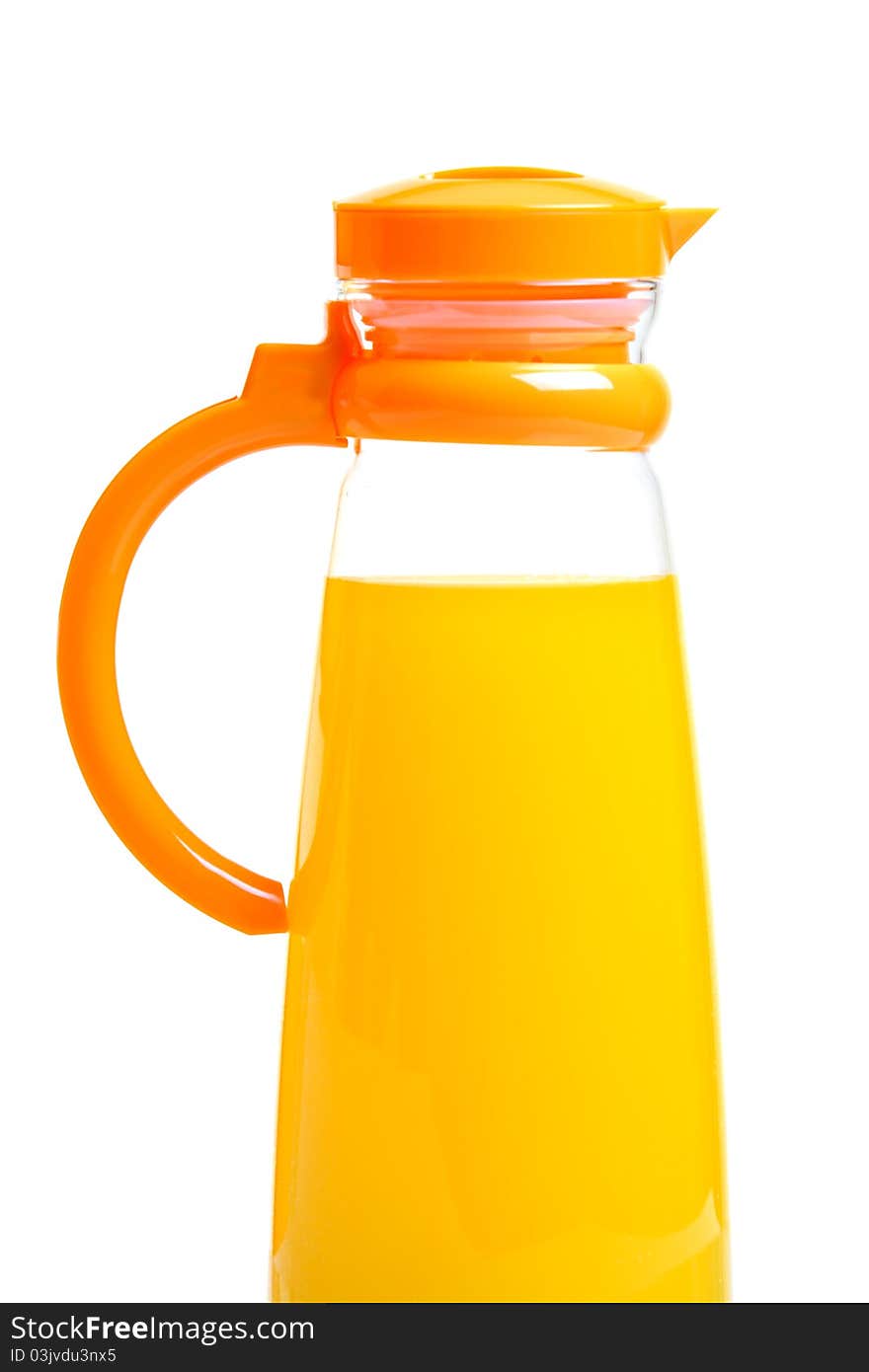 Single pitcher full of orange juice, isolated on white