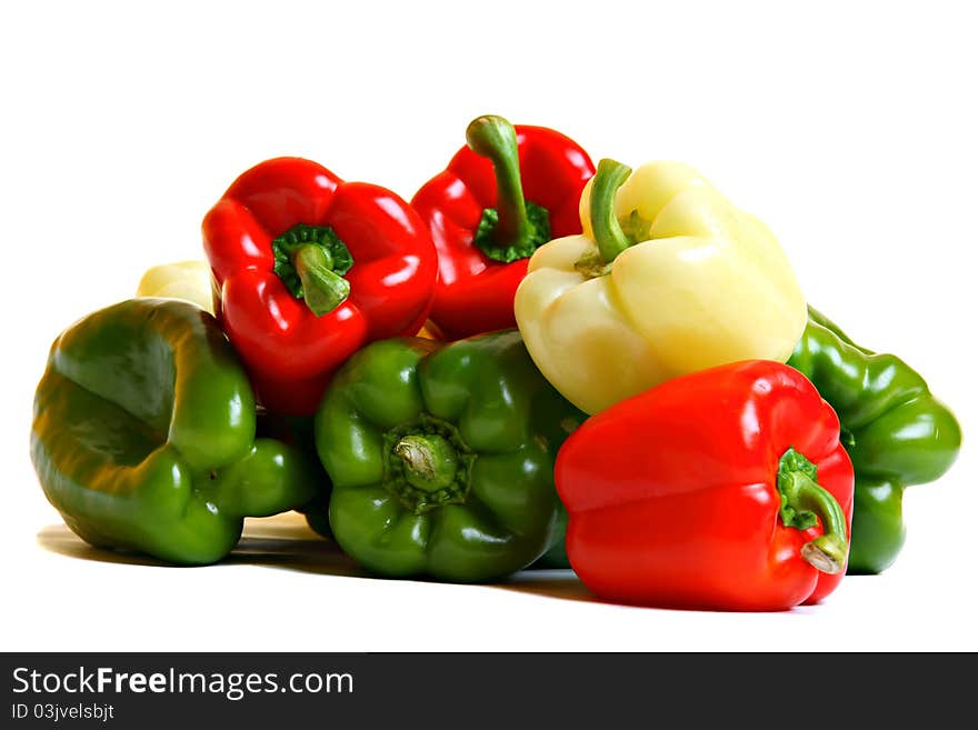 Group of red, yellow and green pepper, isolated on white. Group of red, yellow and green pepper, isolated on white