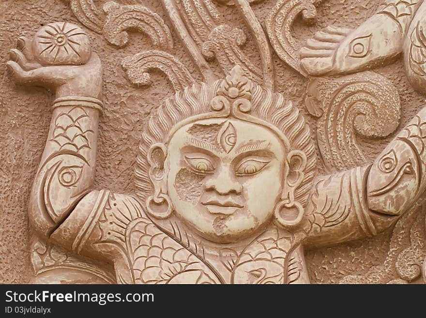 Buddha carved stone. In the temple of Nakhon Sawan.