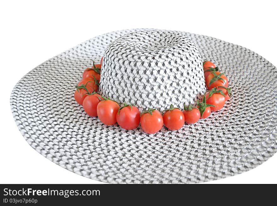 Red tomatoes on the hat