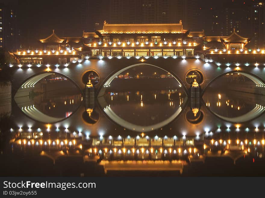 Ancient Chinese Bridge Sparkling at Night