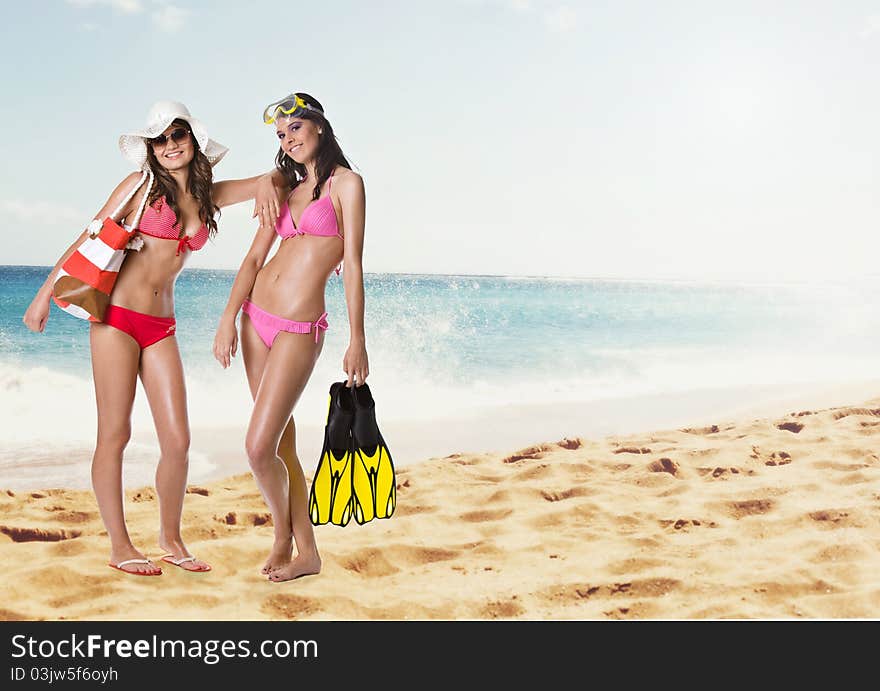 Young happy women at the beach. Young happy women at the beach