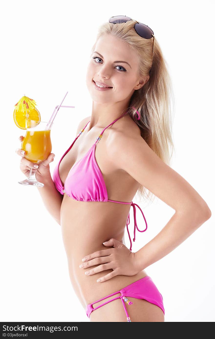 Young attractive girl with a cocktail on a white background. Young attractive girl with a cocktail on a white background