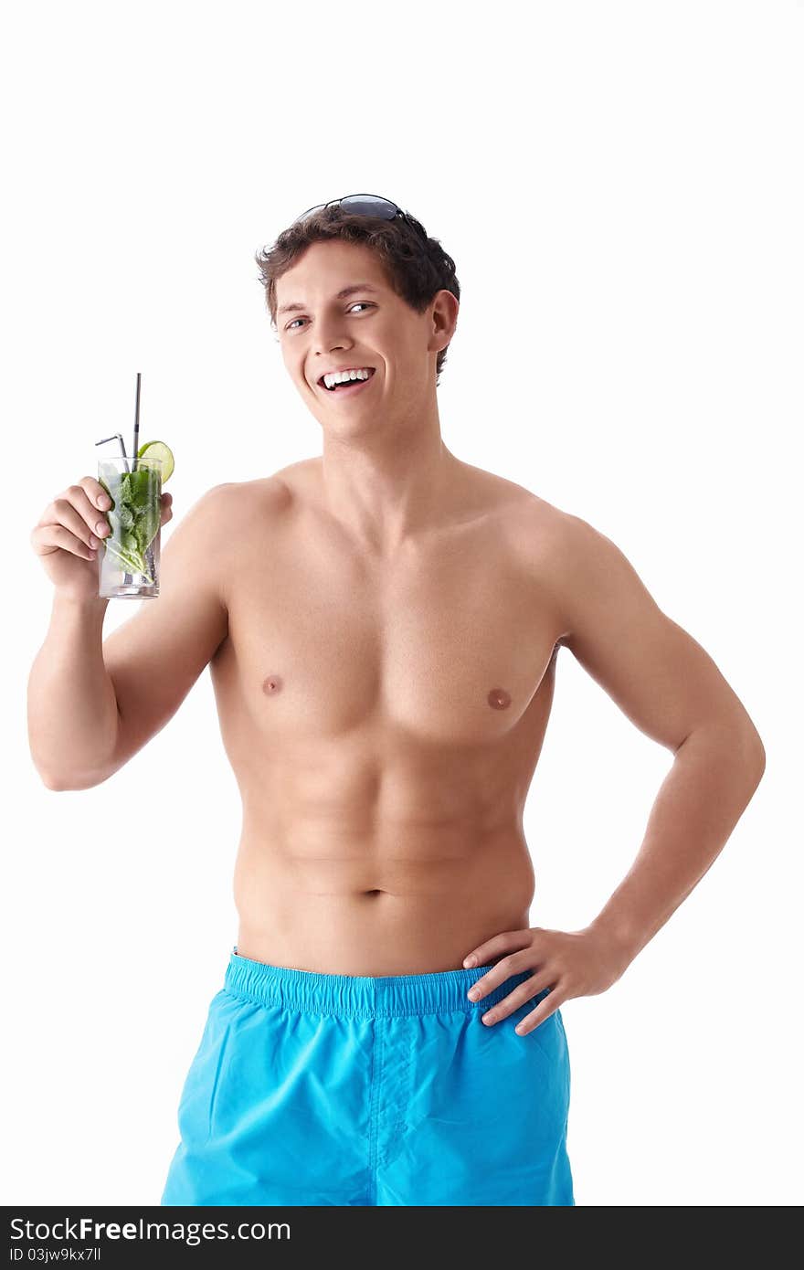 An attractive young man with a mojito on a white background. An attractive young man with a mojito on a white background