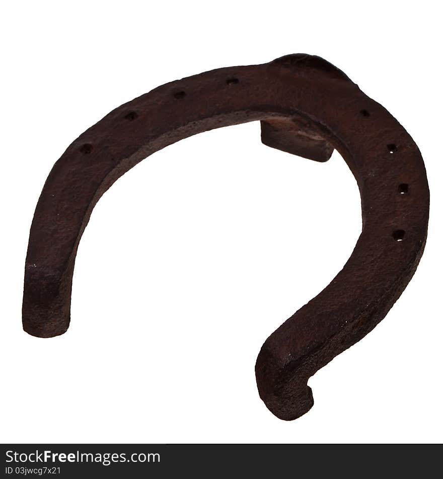 Old rusty horse shoe.