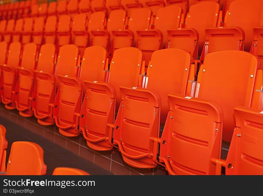 Orange, plastic seats.